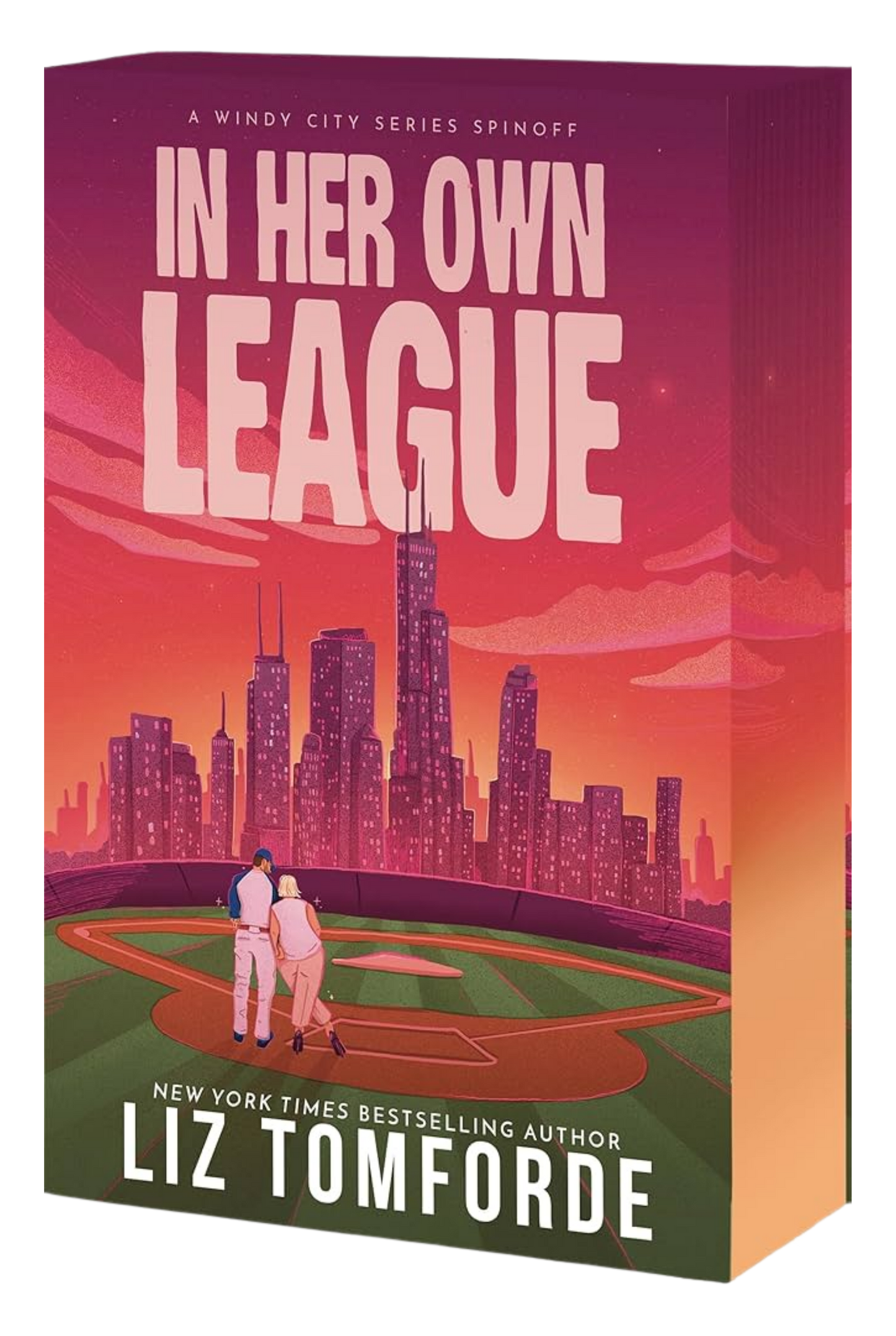 Book cover of 'In Her Own League' by Liz Tomforde with a city skyline and two people on a baseball field.