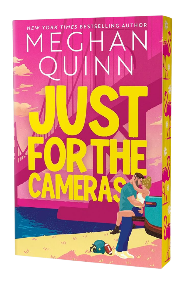 Book cover of 'Just for the Cameras' by Meghan Quinn with a colorful design and couple on a boat.