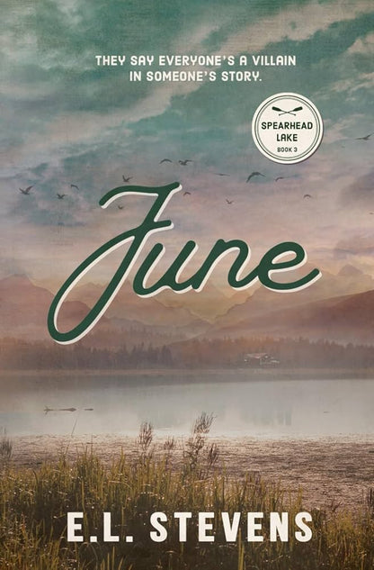 This image features the cover of "June: Jess' Story" from the Spearhead Lake series, specifically indicating it is Book #3. The cover is designed with a serene landscape of a lake surrounded by a grassy shore under a spacious sky, enhancing a sense of tranquility and introspective atmosphere suitable for the story's themes.