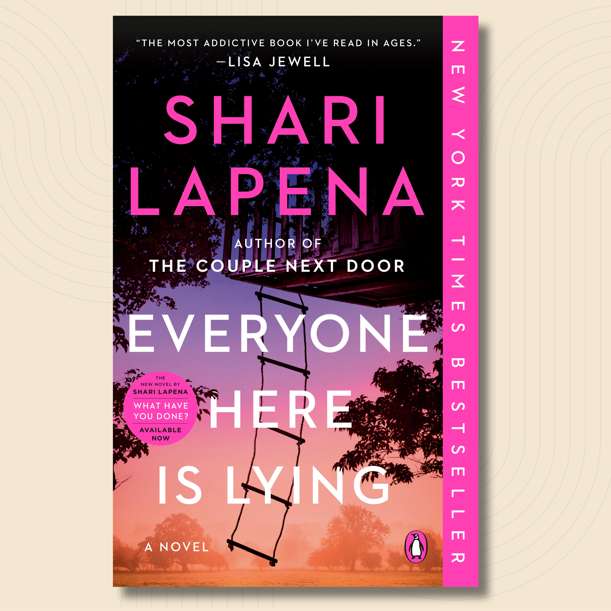 Book cover for the novel 'Everyone Here Is Lying' by Shari Lapena, featuring a pink and orange sunset sky, silhouetted trees, and a ladder leading up to a house. The title is written in large white letters, with the author's name in bright pink.