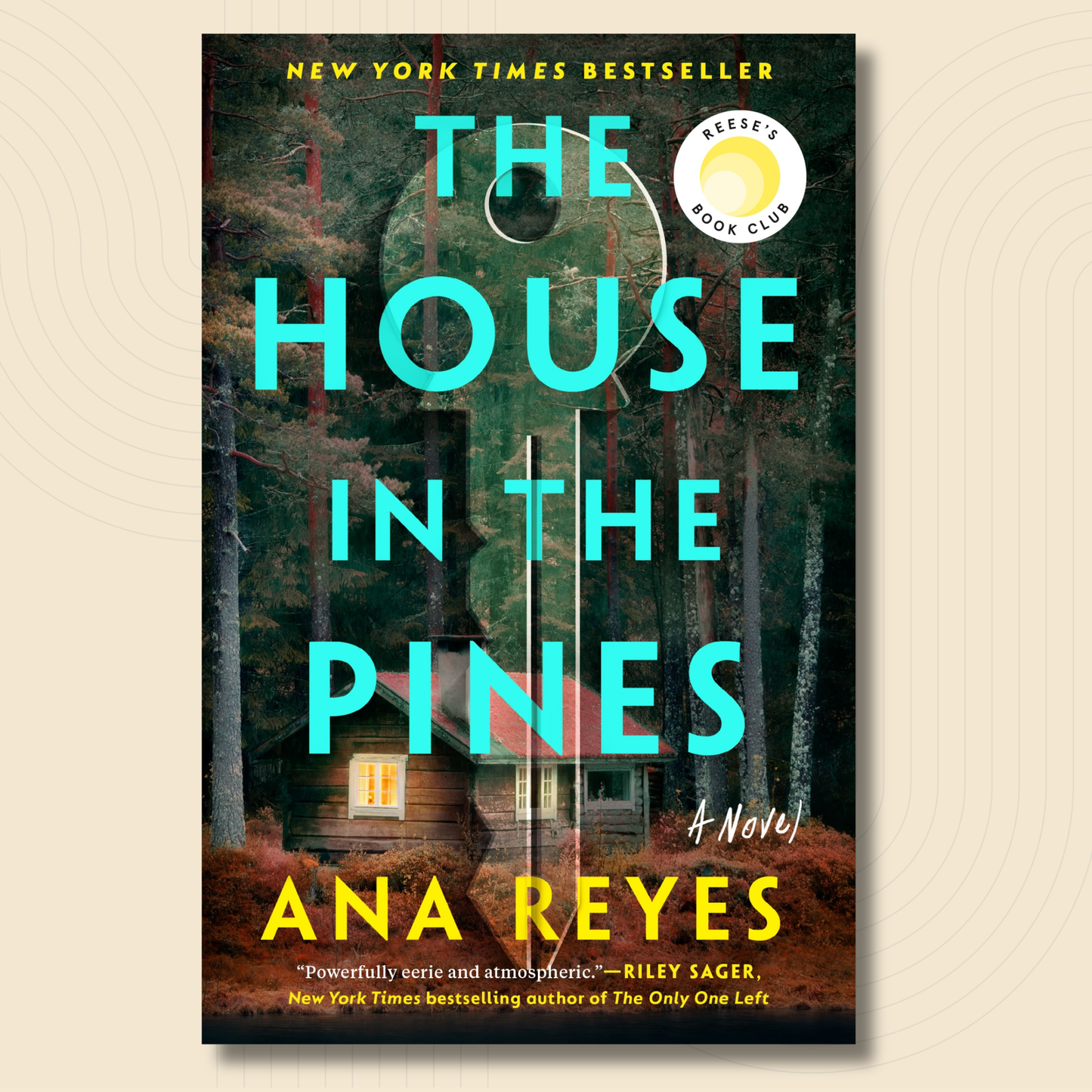Book cover for the novel 'The House in the Pines' by Ana Reyes, featuring a rustic cabin in a pine forest with large turquoise title text and a Reese's Book Club badge, shown on a light beige background.