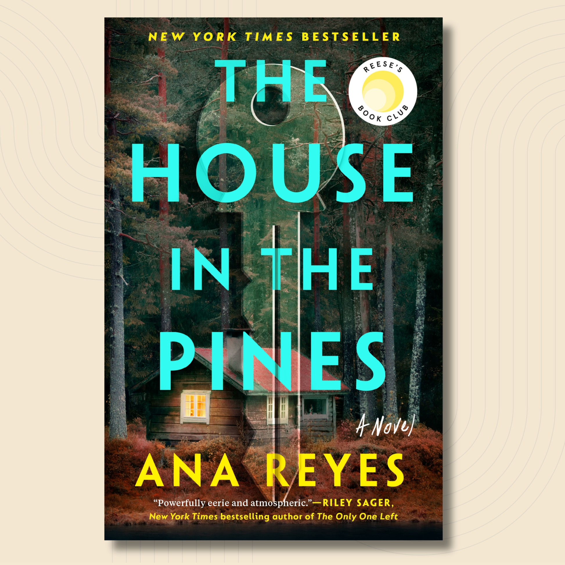 Book cover for the novel 'The House in the Pines' by Ana Reyes, featuring a rustic cabin in a pine forest with large turquoise title text and a Reese's Book Club badge, shown on a light beige background.