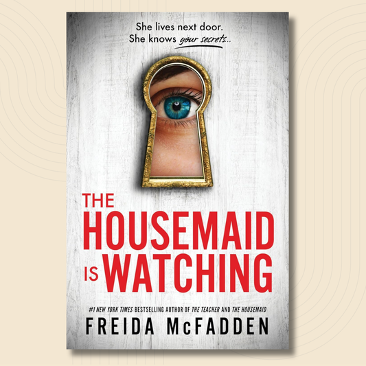 Book cover for 'The Housemaid is Watching' by Freida McFadden, featuring a keyhole-shaped cutout with a blue eye inside on a white wood-textured background, with red and black title text.