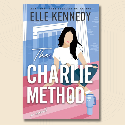 Book cover for 'The Charlie Method' by Elle Kennedy, featuring a stylized illustration of a woman sitting on pink steps with a blue mug, set against a light blue building background. The title is in large white letters, and the author's name is at the top.