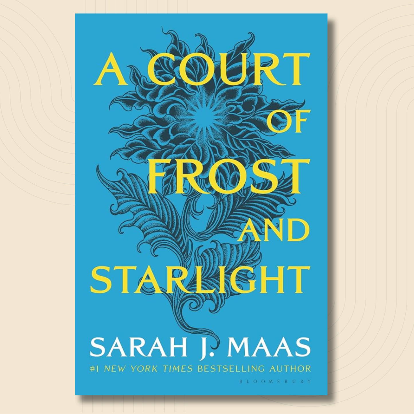 Book cover for 'A Court of Frost and Starlight' by Sarah J. Maas, featuring a bright blue background with a dark blue floral illustration and yellow title text, shown on a light beige background with subtle concentric circle patterns.