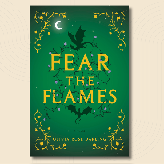 Book cover for 'Fear the Flames' by Olivia Rose Darling, featuring a dark green background with gold title lettering, a black dragon silhouette, and ornate gold vine borders on a light beige background.