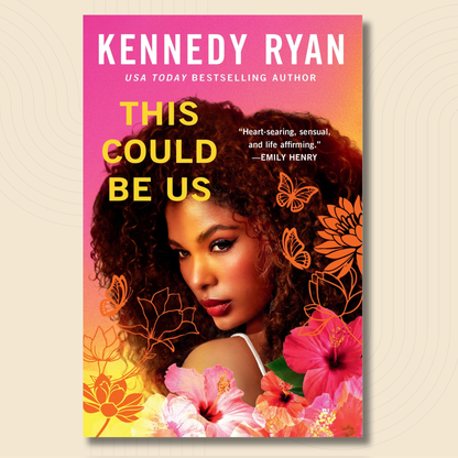 Book cover for 'This Could Be Us' by Kennedy Ryan, featuring a portrait of a woman with voluminous curly hair, surrounded by pink hibiscus flowers and orange butterfly line art on a pink-to-yellow gradient background.