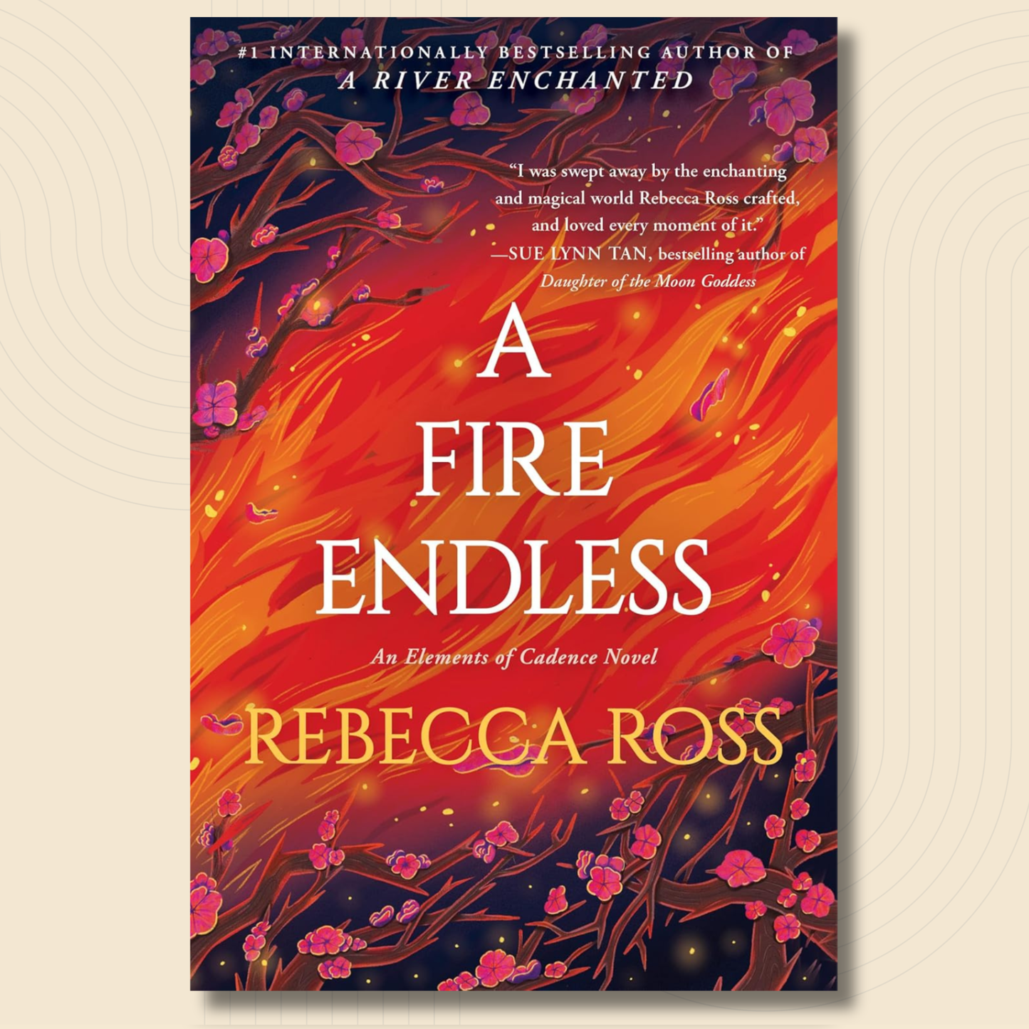 Book cover for 'A Fire Endless' by Rebecca Ross, featuring a dramatic red and orange flame-like pattern with dark branches and pink blossoms, shown on a light beige background.