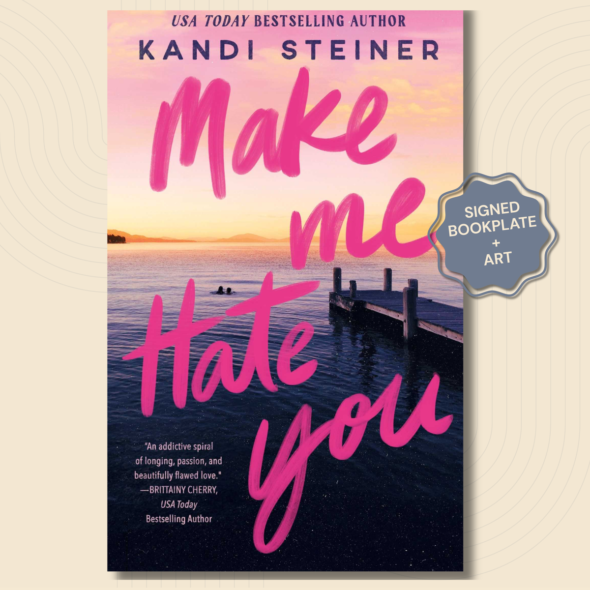 Book cover for 'Make Me Hate You' by Kandi Steiner, featuring a pink and purple sunset sky over calm water with a dock, plus a gray 'Signed Bookplate + Art' badge on a light beige background.
