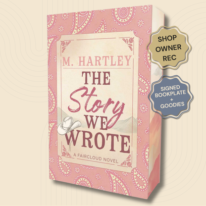 Book cover for 'The Story We Wrote' by M. Hartley, featuring a pink paisley design with a cream central label and a small white cowboy hat illustration.