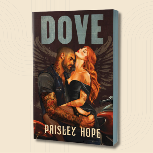 A 3D mockup of a paperback book cover titled 'DOVE' by Prisley Hope, featuring an illustration of a tattooed man and a red-haired woman embracing on a motorcycle, set against a light beige background with subtle concentric circle patterns.