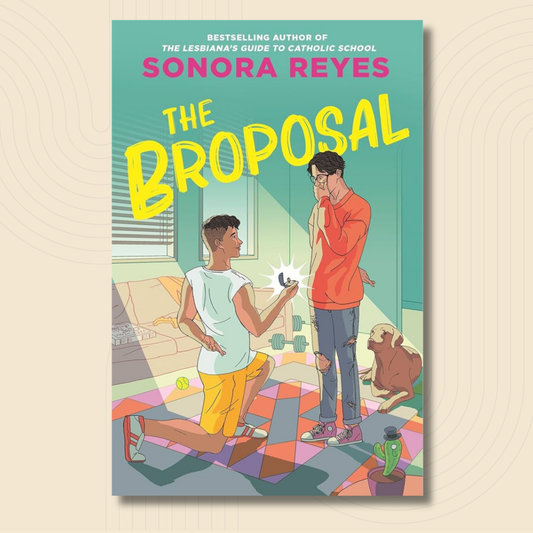Book cover for 'The Proposal' by Sonora Reyes, featuring a colorful illustration of two young men in a living room, one kneeling and proposing a ring. The book is centered on a light beige background with subtle concentric wave patterns.