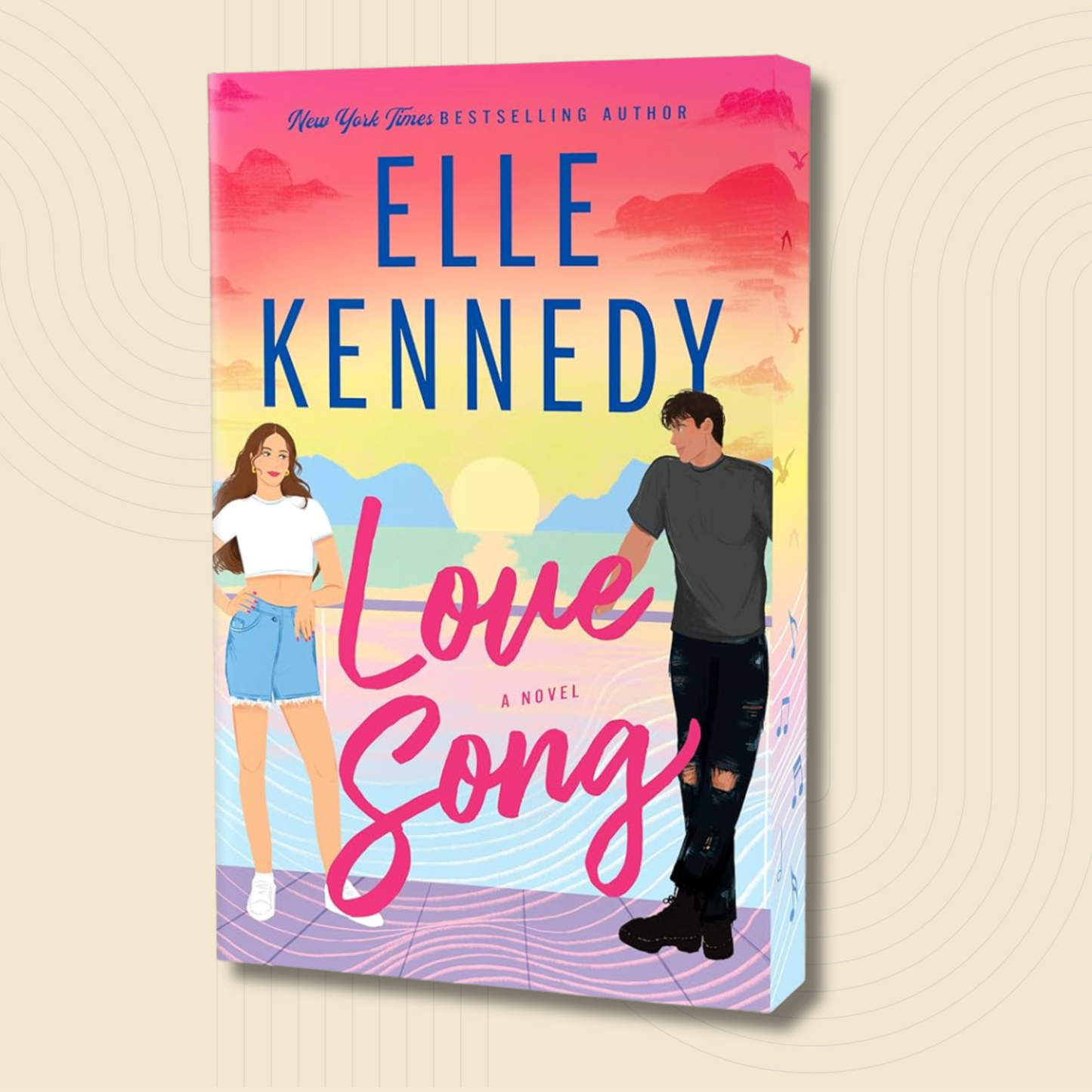 A 3D mockup of the book cover for 'Love Song' by Elle Kennedy, featuring a vibrant sunset gradient background with illustrated characters and bold typography, set against a light beige background with subtle concentric circle patterns.