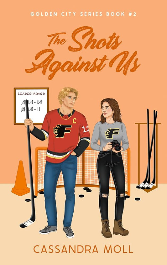 Book cover of 'The Shots Against Us' featuring two characters in hockey gear on an orange background.