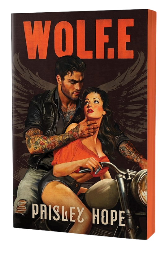 Book cover of 'WOLFE' by Paisley Hope featuring a couple on a motorcycle with wings.